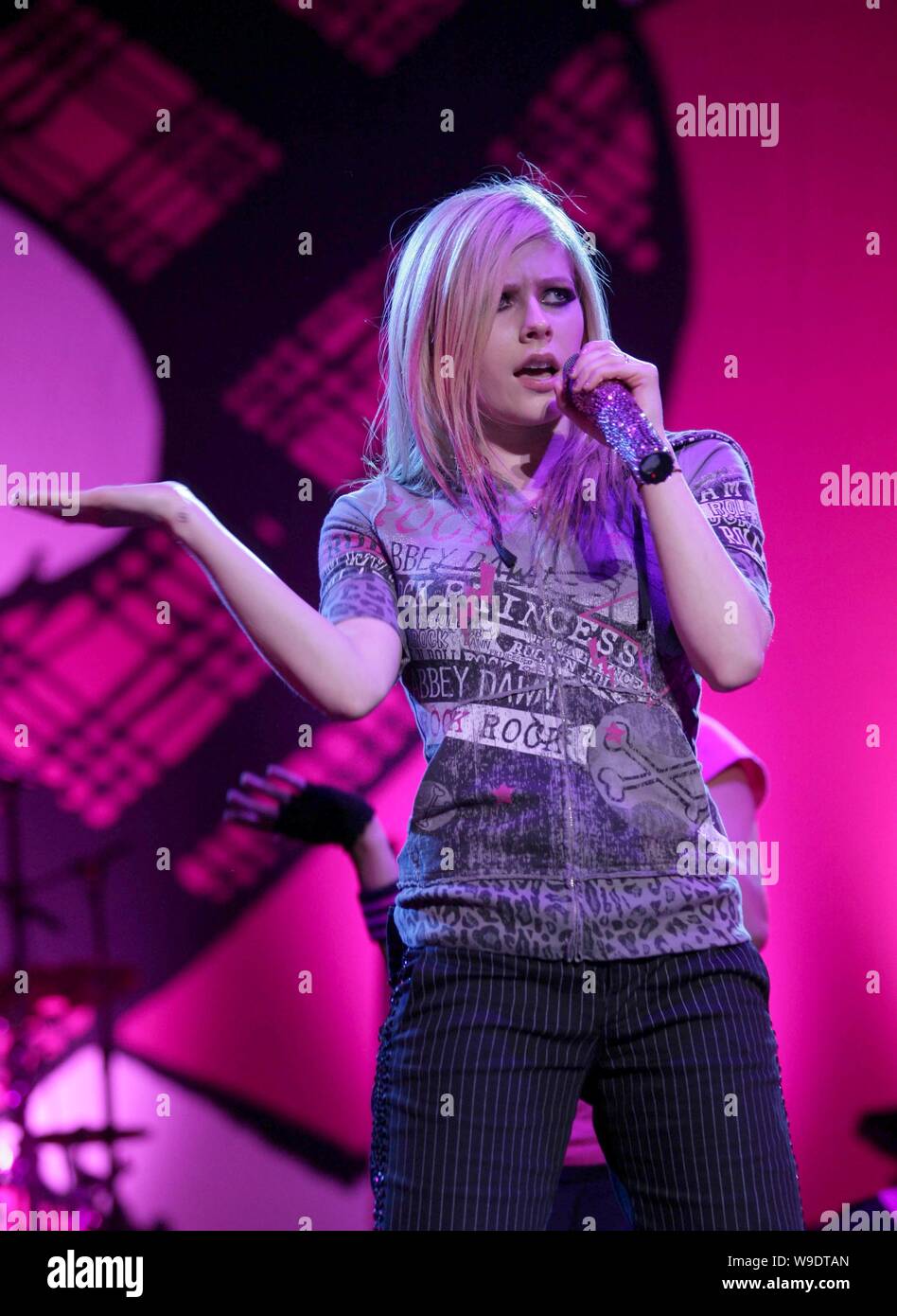 Canadian singer Avril Lavigne performs at a solo concert of her tour, The Best Damn Tour, at Beijing Olympic Basketball Gymnasium in Beijing, China, S Stock Photo