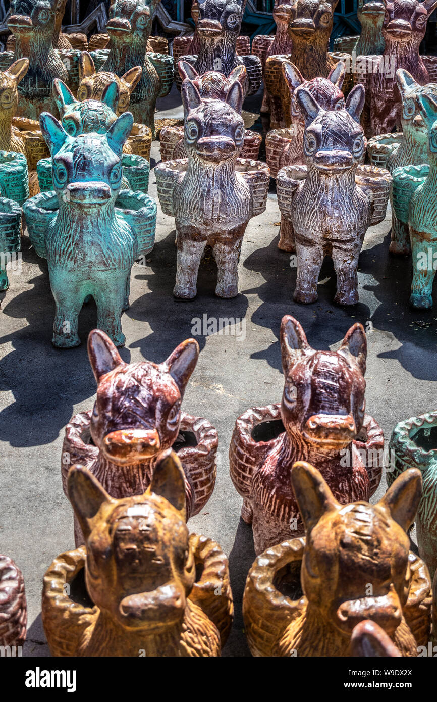 Pottery animal planters on sale at a roadside shop, Texas, USA Stock