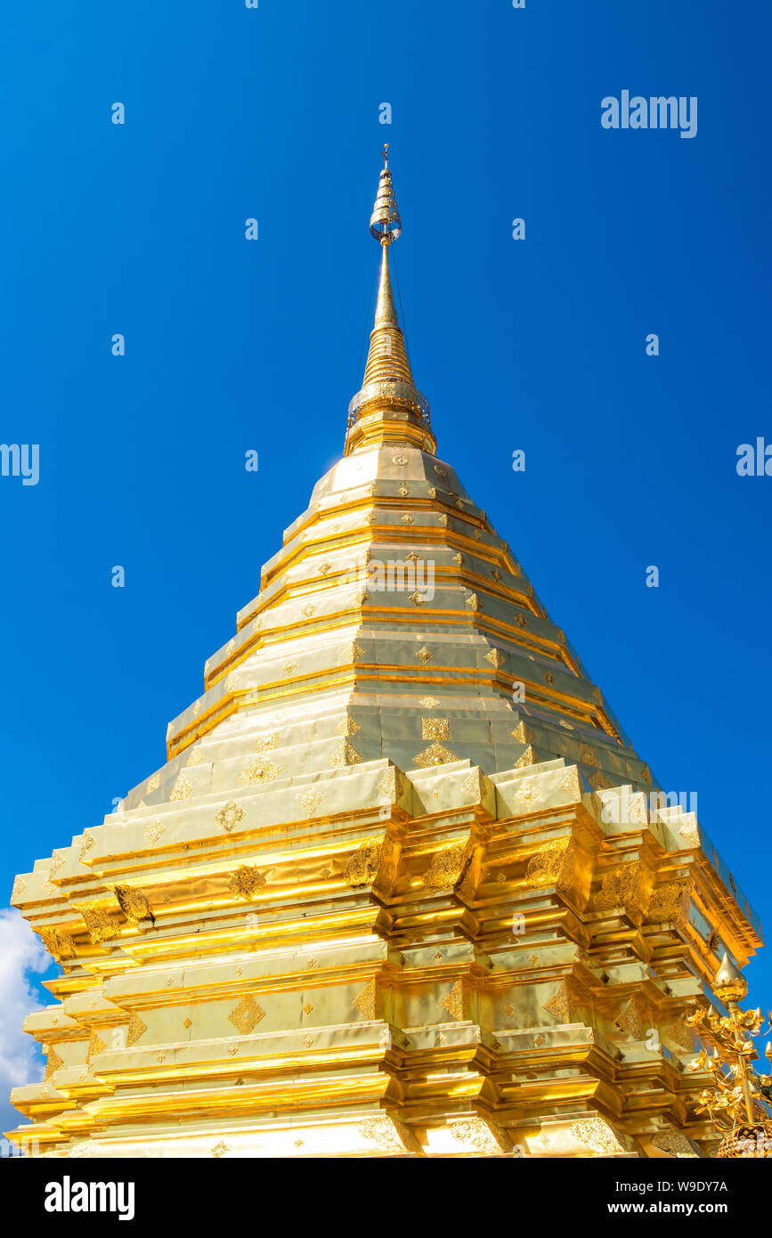 Wat Phra That Doi Suthep with blue sky in Chiang Mai. The attractive sightseeing place for tourists and landmark of Chiang Mai,Thailand Stock Photo