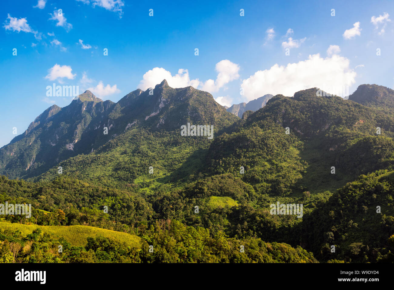 Doi Luang Chiang Dao mountain with sky and cloud in daytime,The famous mountain for tourist to visit in Chiang Mai,Thailand. Stock Photo