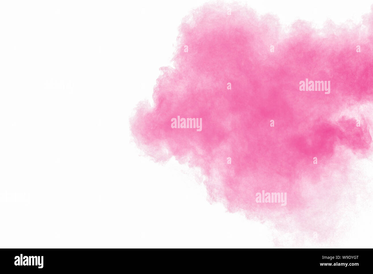 Abstract pink powder explosion on white background. Freeze motion of ...