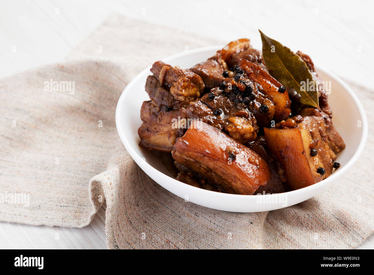 Homemade Filipino Adobo Pork in a white bowl, side view. Closeup Stock Photo Alamy