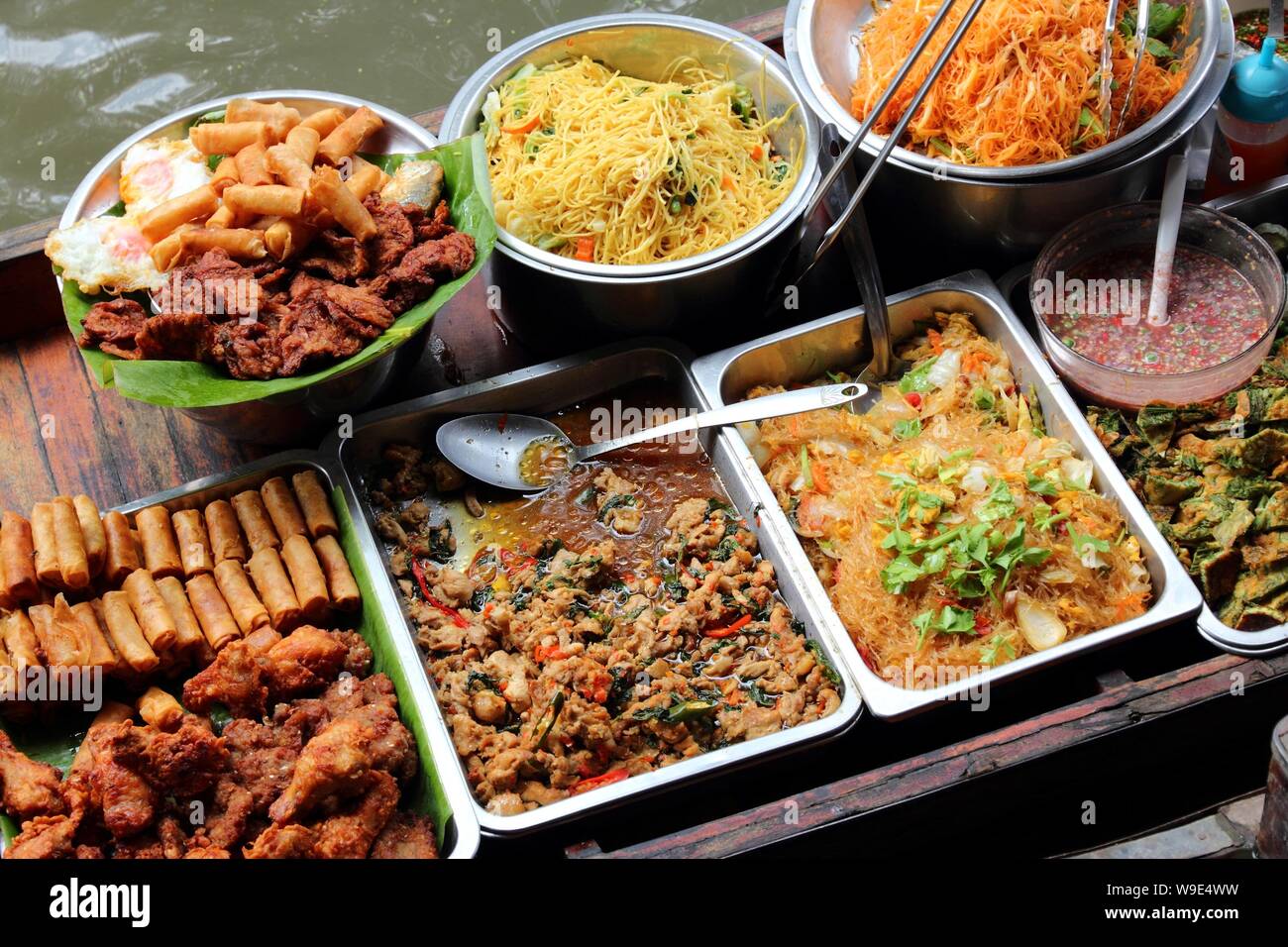Thai food vendor boat restaurant at Damnoen Saduak floating market