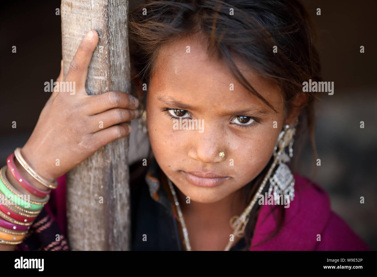 Young tribal girl in a rural village in the district of Kutch, Gujarat. The Kutch region is well known for its tribal life and traditional culture. Stock Photo