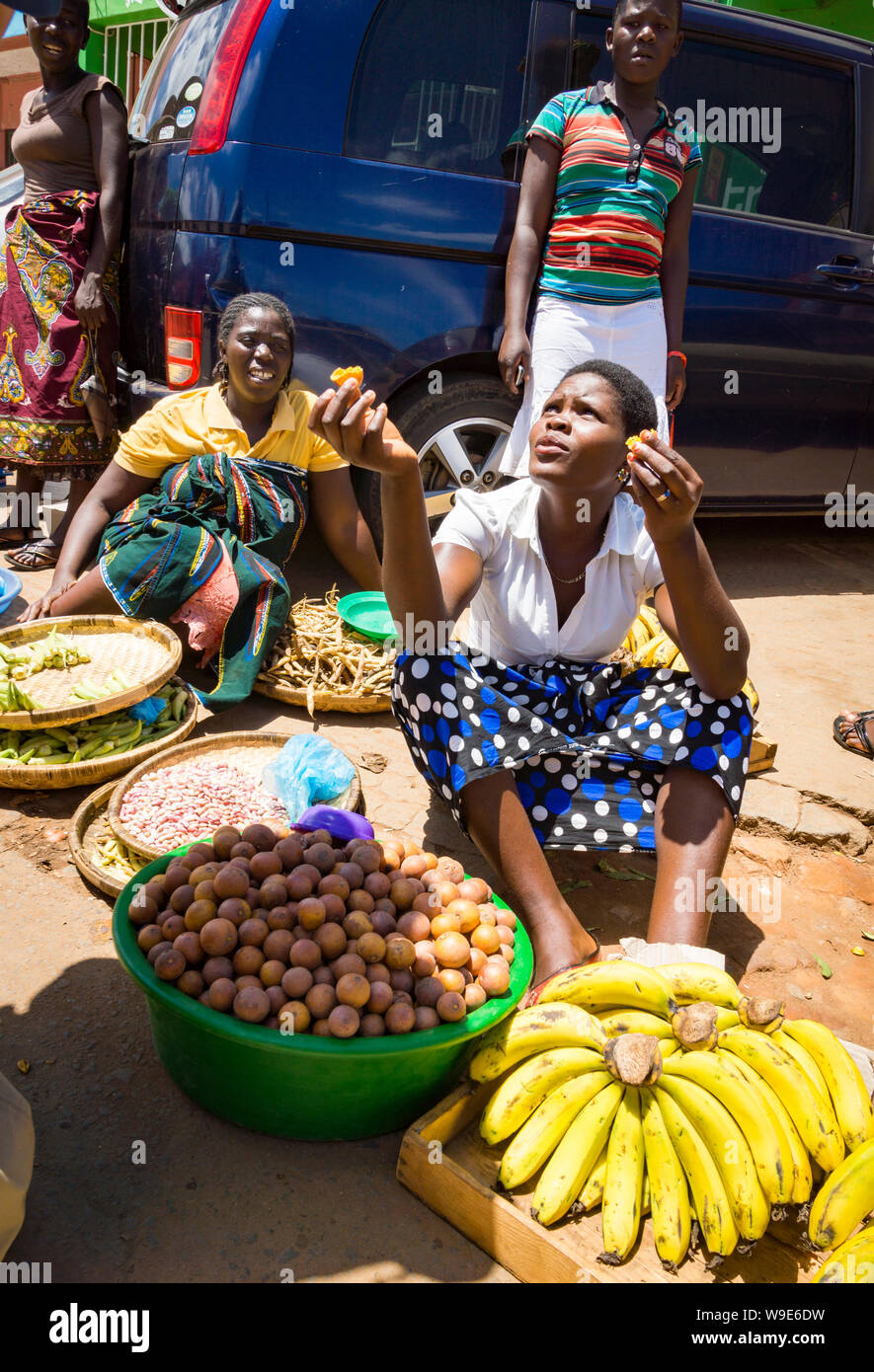 Women market traders selling fruit in Mzuzu, Malawi Stock Photo