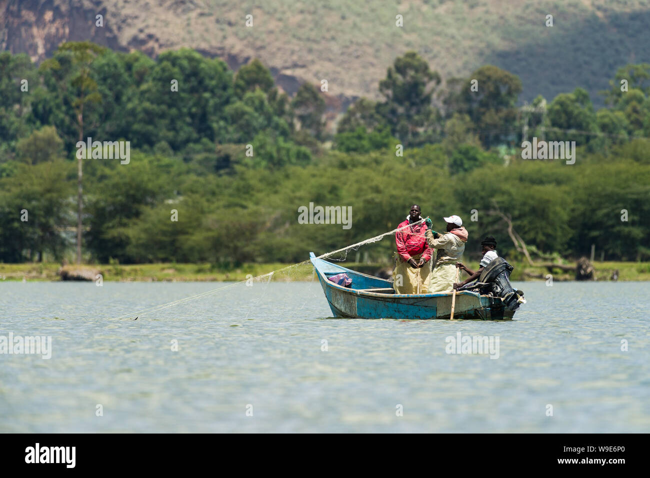 Two men fishing in a small boat on the Lake Baringo. Kenya, Africa Stock  Photo - Alamy