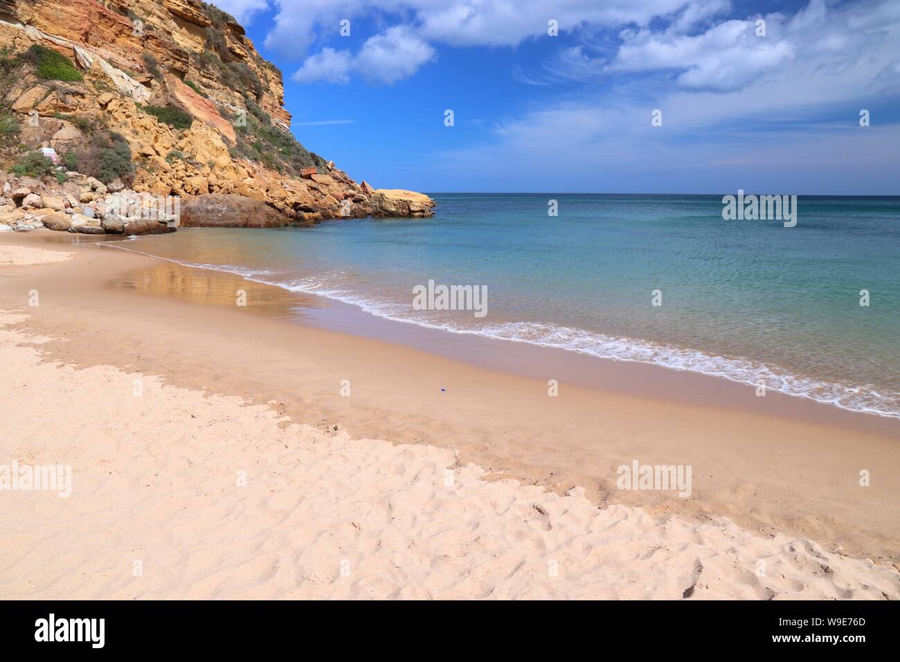 Portugal Atlantic coast landscape in Algarve region. Burgau sandy beach. Stock Photo