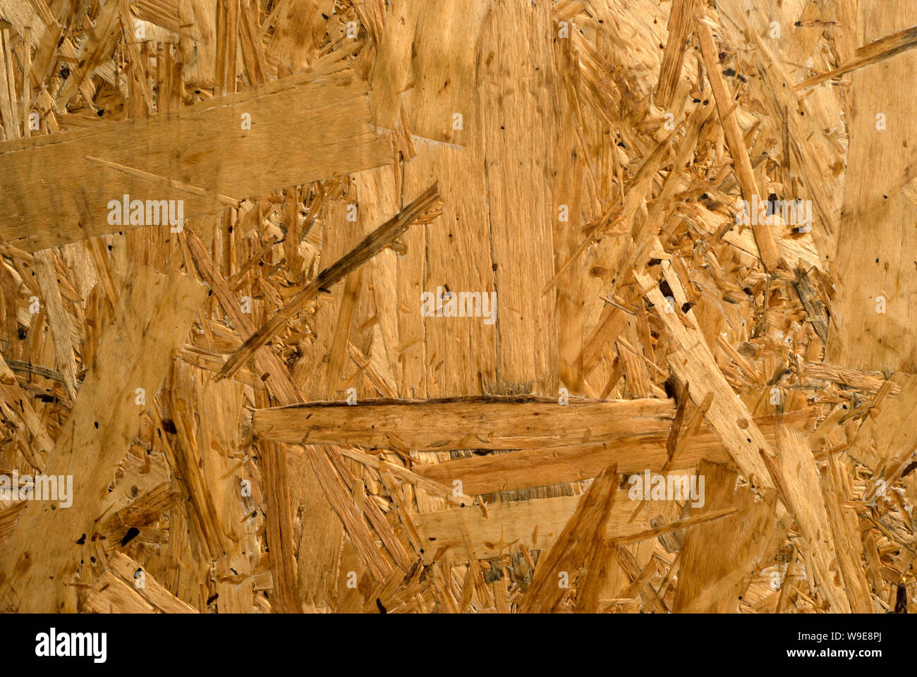 background, texture - surface of rough chipboard close-up Stock Photo