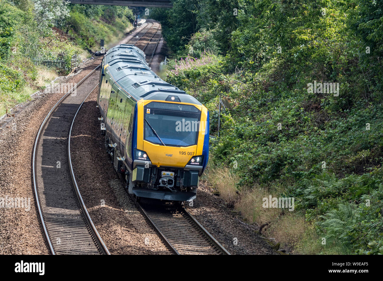 New Class 195 diesel DMU train running on the Manchester to Liverpool line to replace The P{acer. Stock Photo