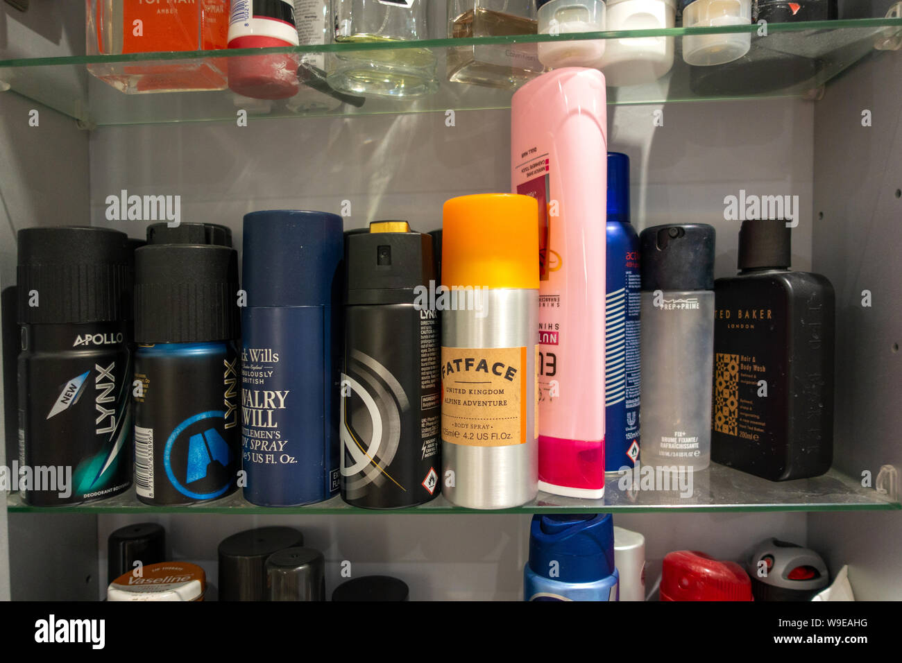 closeup of mans toiletries on a bathroom shelf Stock Photo Alamy