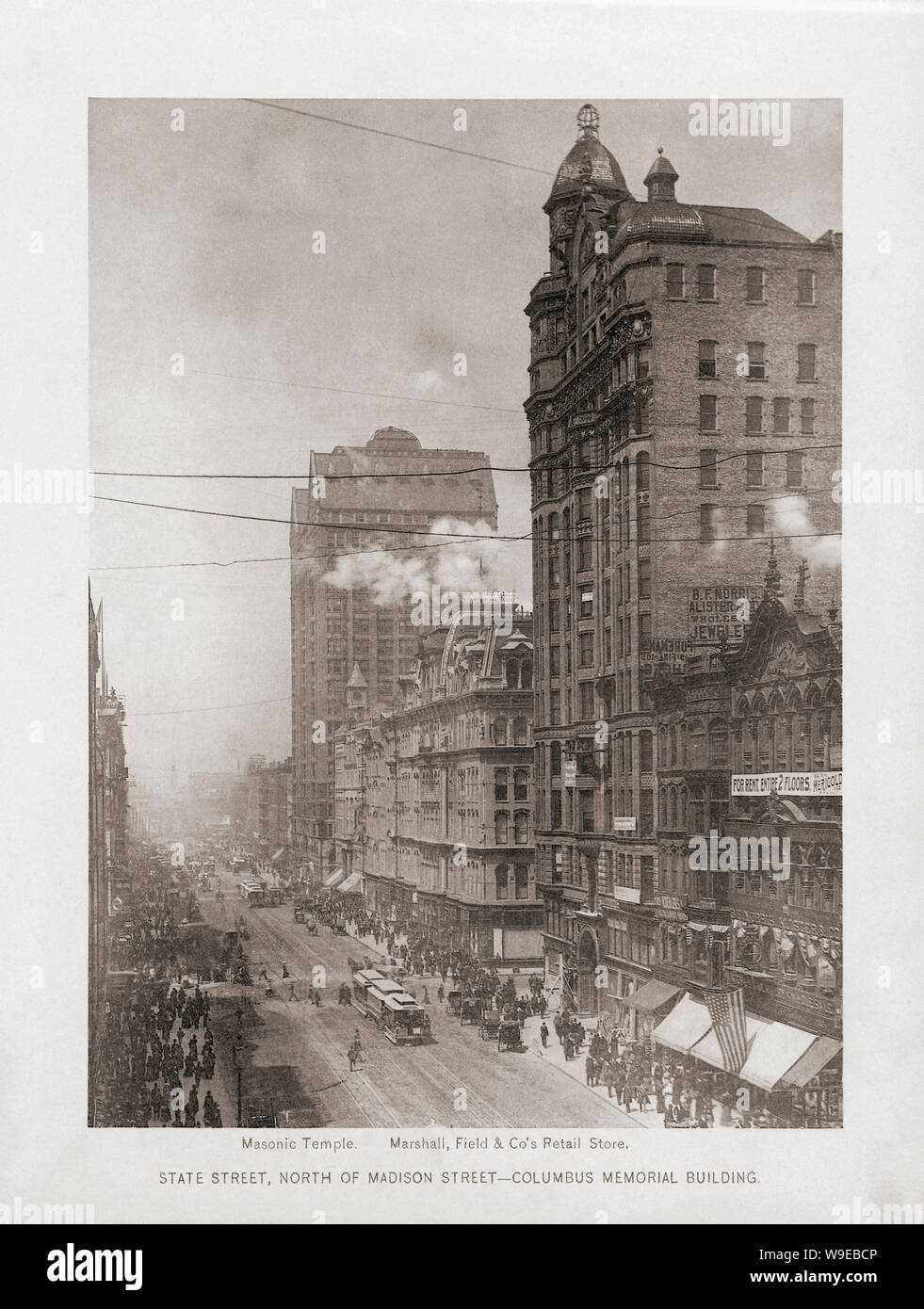 State Street, North of Madison Street with Columbus Memorial Building, Chicago, Illinois, USA.  From the book The United States of America - One Hundred Albertype Illustrations From Recent Negatives of the Most Noted Scenes of Our Country, published 1893. Stock Photo