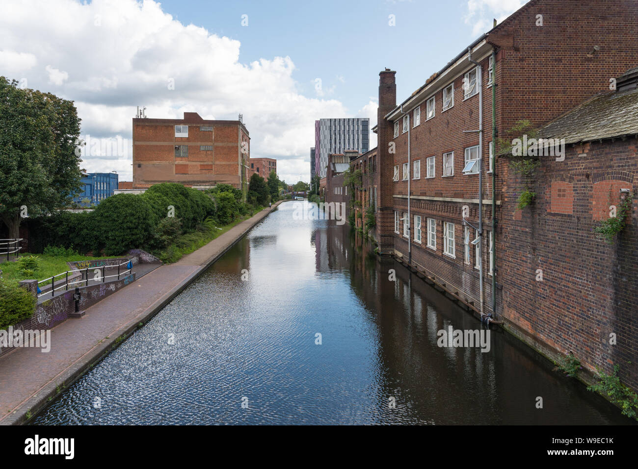 Old red brick buildings lining the Fazeley canal in Aston, Birmingham, UK Stock Photo