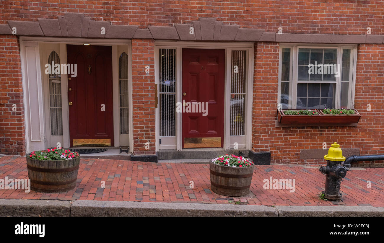 Acorn Street in Beacon Hill district, Boston, Massachusetts, USA - July 28, 2018: Entries of mansions in the Beacon Hill district in the city of Bosto Stock Photo