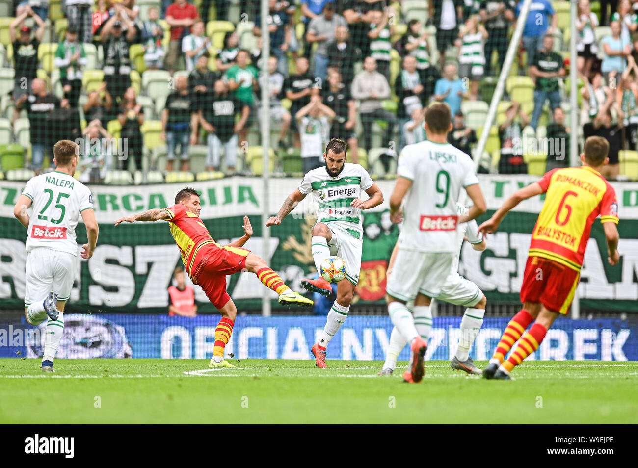 Patryk Klimala from Jagiellonia Bialystok (L) and Blazej Augustyn from Lechia Gdansk (R) are seen in action during the PKO Ekstraklasa League match between Lechia Gdansk and Jagiellonia Bialystok.(final score; Lechia Gdansk 1:1 Jagiellonia Bialystok). Stock Photo