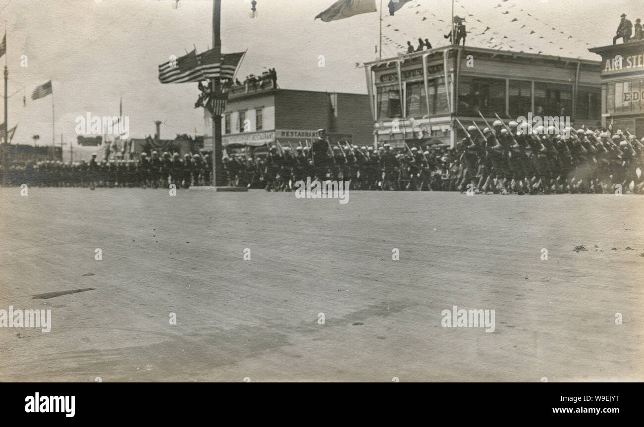Antique 1908 photograph, Navy sailors march at the “Parade for the Great White Fleet” on Van Ness Ave., San Francisco, California on May 7th, 1908. SOURCE: ORIGINAL PHOTOGRAPH Stock Photo