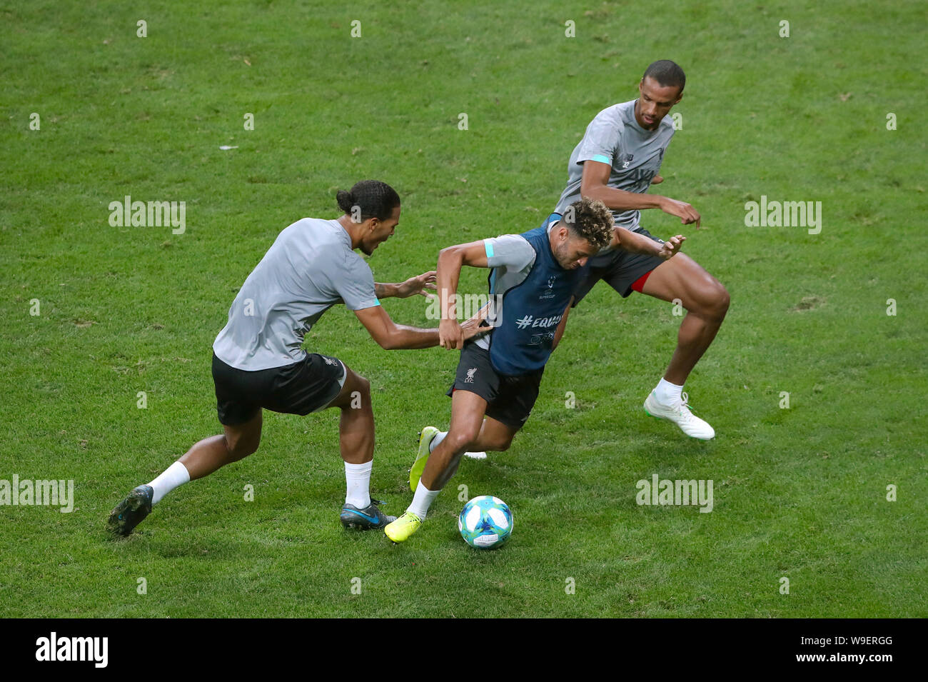 Liverpool's Virgil van Dijk (left), Liverpool's Alex Oxlade-Chamberlain (centre) and Liverpool's Joel Matip during the training session at Besiktas Park, Istanbul. Stock Photo
