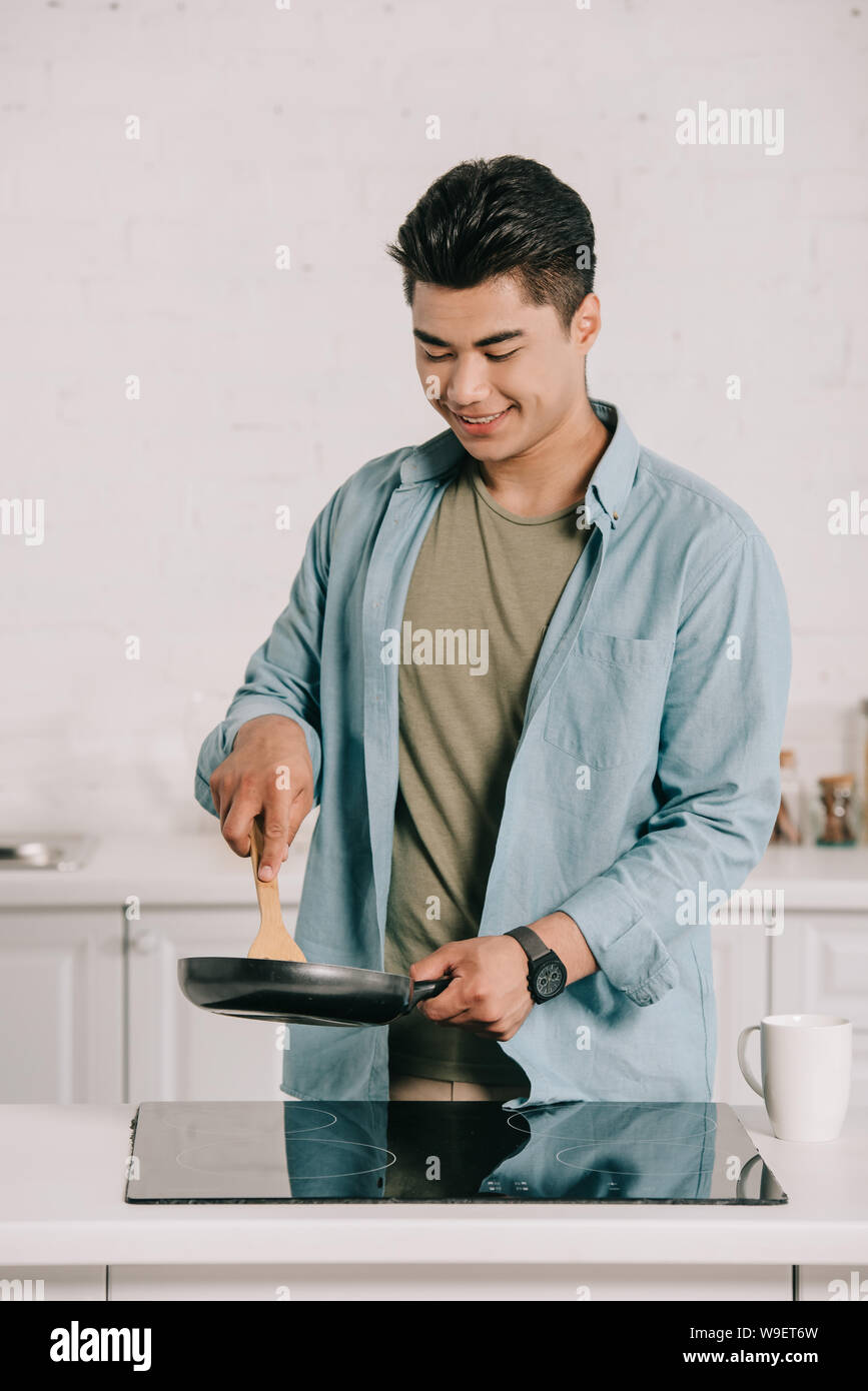 Asian man cooking hi-res stock photography and images - Alamy