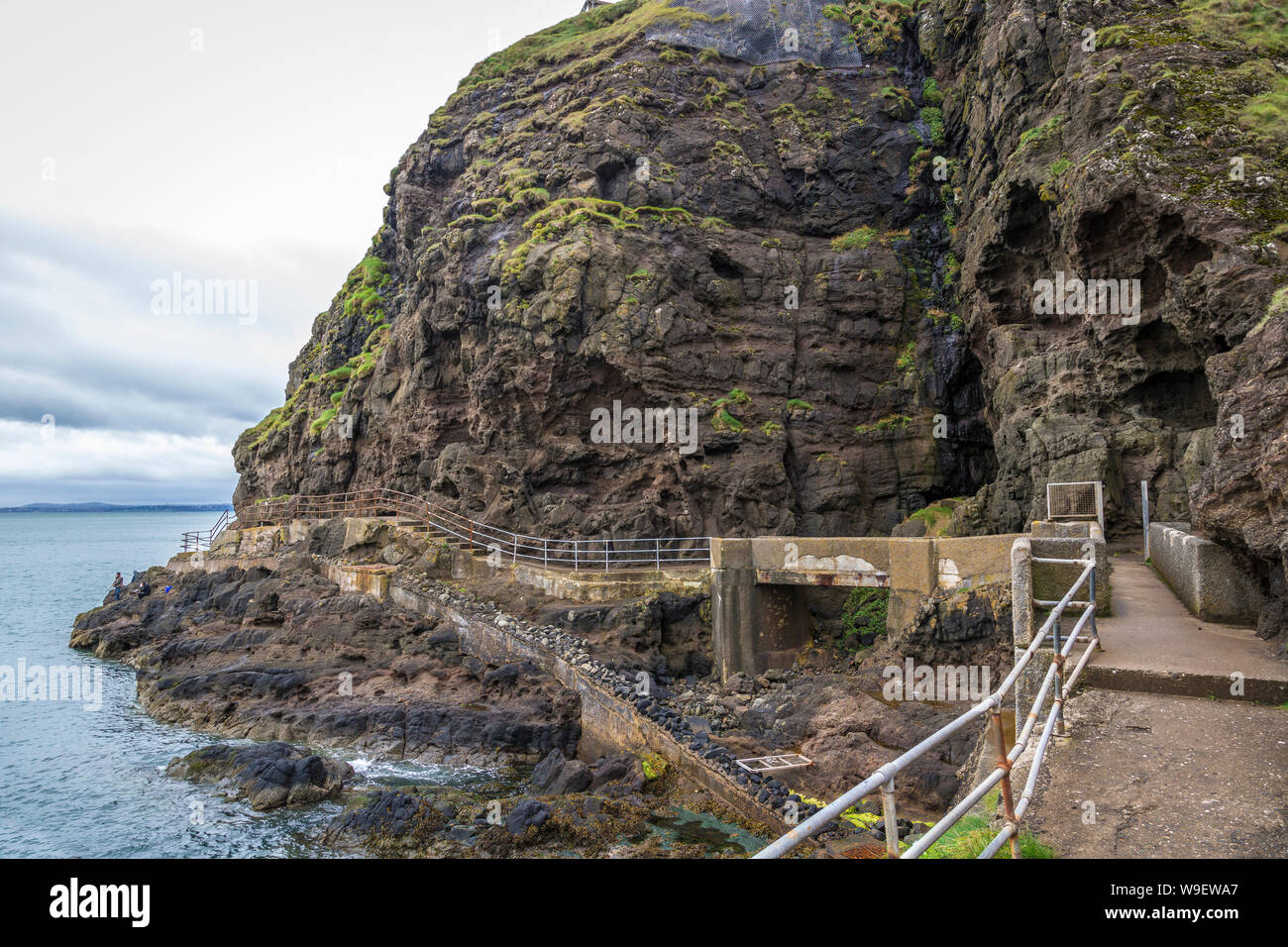 spectacular cliff walk at the Blackhead Lighthouse, Co Antrim, Northern Ireland Stock Photo