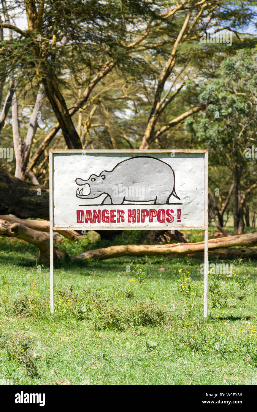 Danger hippos warning sign at lake Naivasha, Kenya, East Africa Stock Photo