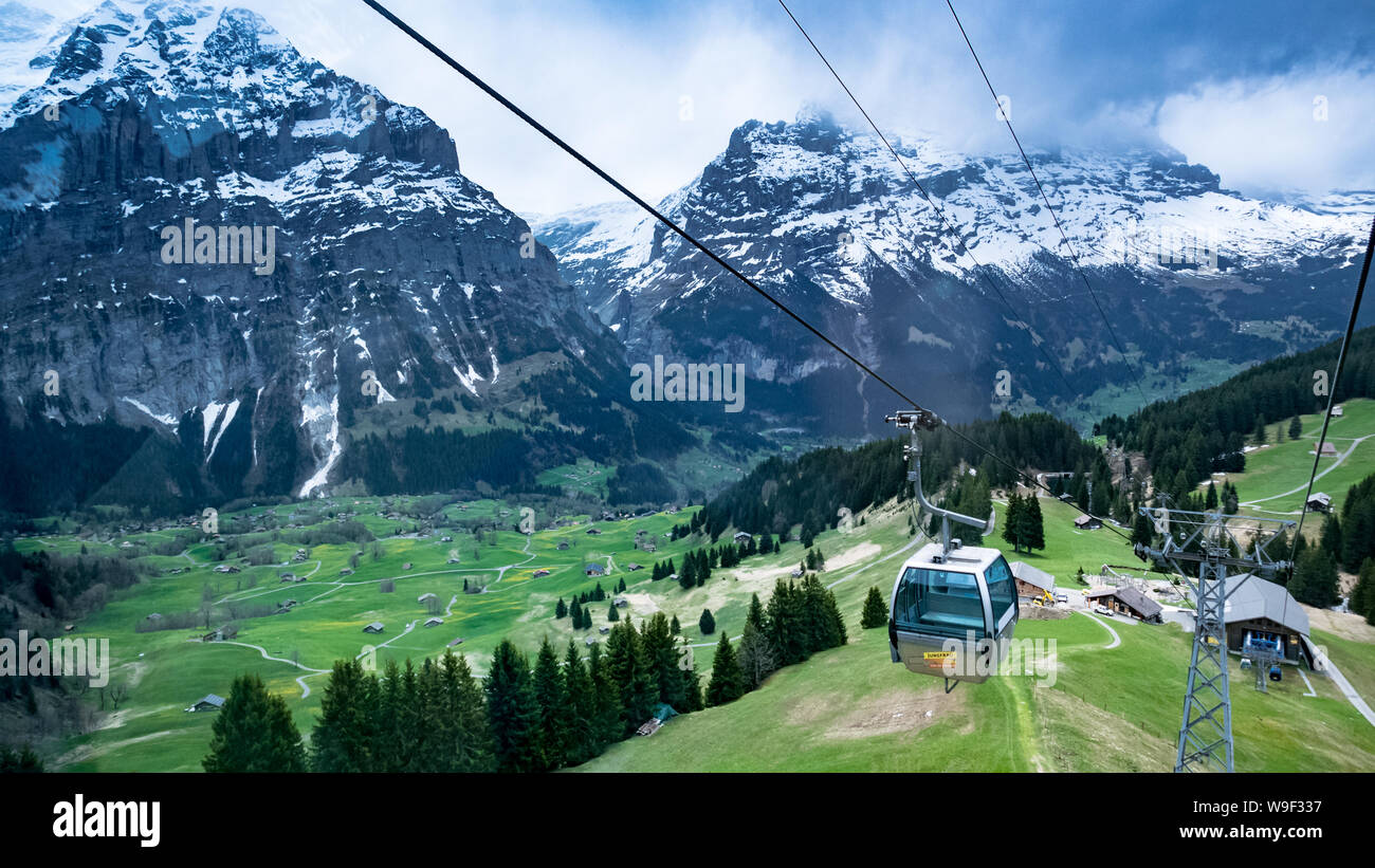 On board the cable car above Grindelwald village, Switzerland Stock