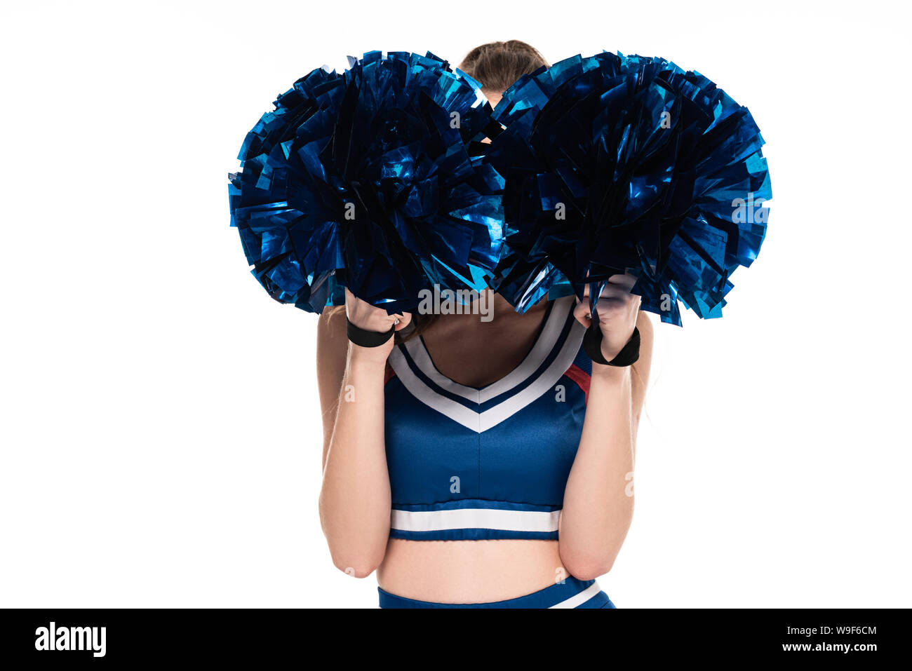cheerleader girl in blue uniform with obscure face and pompoms isolated on  white Stock Photo - Alamy