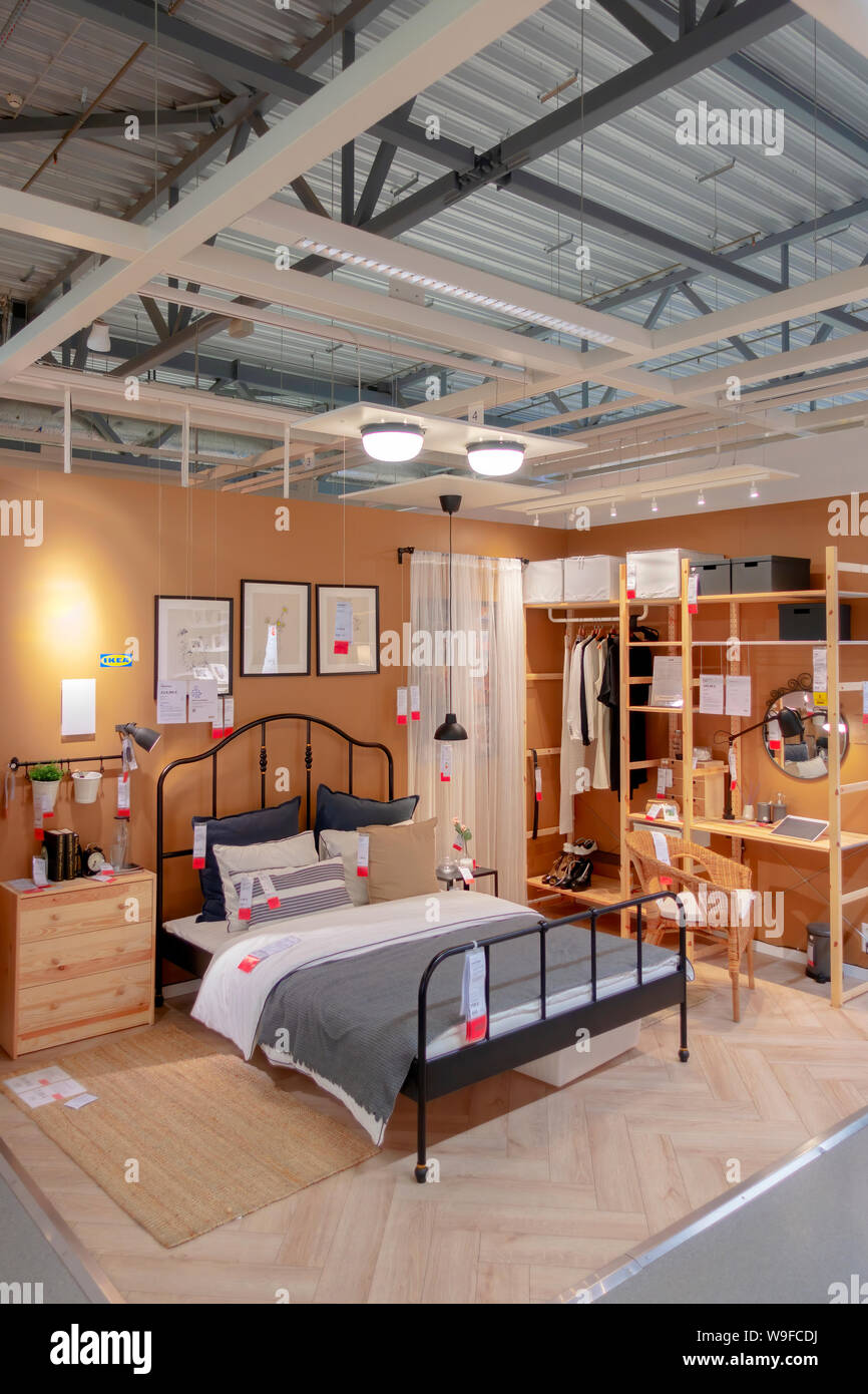 Interior view of bedroom inside IKEA Store. IKEA is Swedishfounded