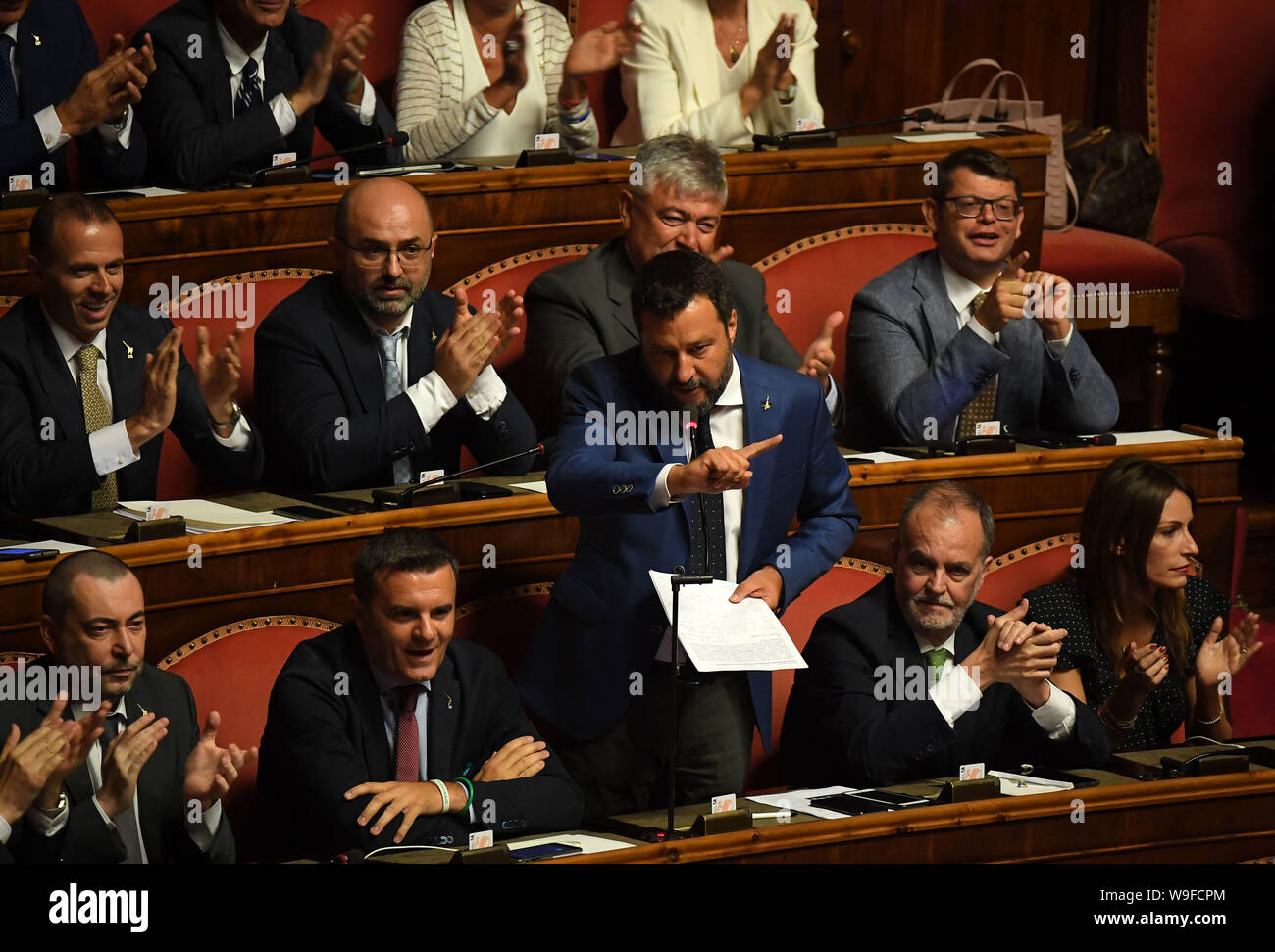 (190813) -- ROME, Aug. 13, 2019 (Xinhua) -- Italian Interior Minister Matteo Salvini speaks to the Senate in Rome, Italy, on Aug. 13, 2019. Italian Interior Minister Matteo Salvini, leader of the rightwing, anti-immigrant League party, told the Senate on Tuesday that he is willing to vote on a reform that would reduce the number of members of parliament as long as this is followed by an immediate snap election. This appears to postpone an impending government crisis, which Salvini unleashed last week when he announced his party had filed a no-confidence motion against Prime Minister Giuseppe C Stock Photo