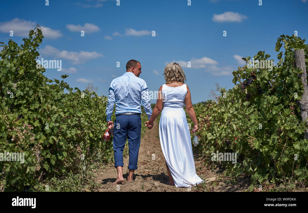 couple in love among the vineyards Stock Photo