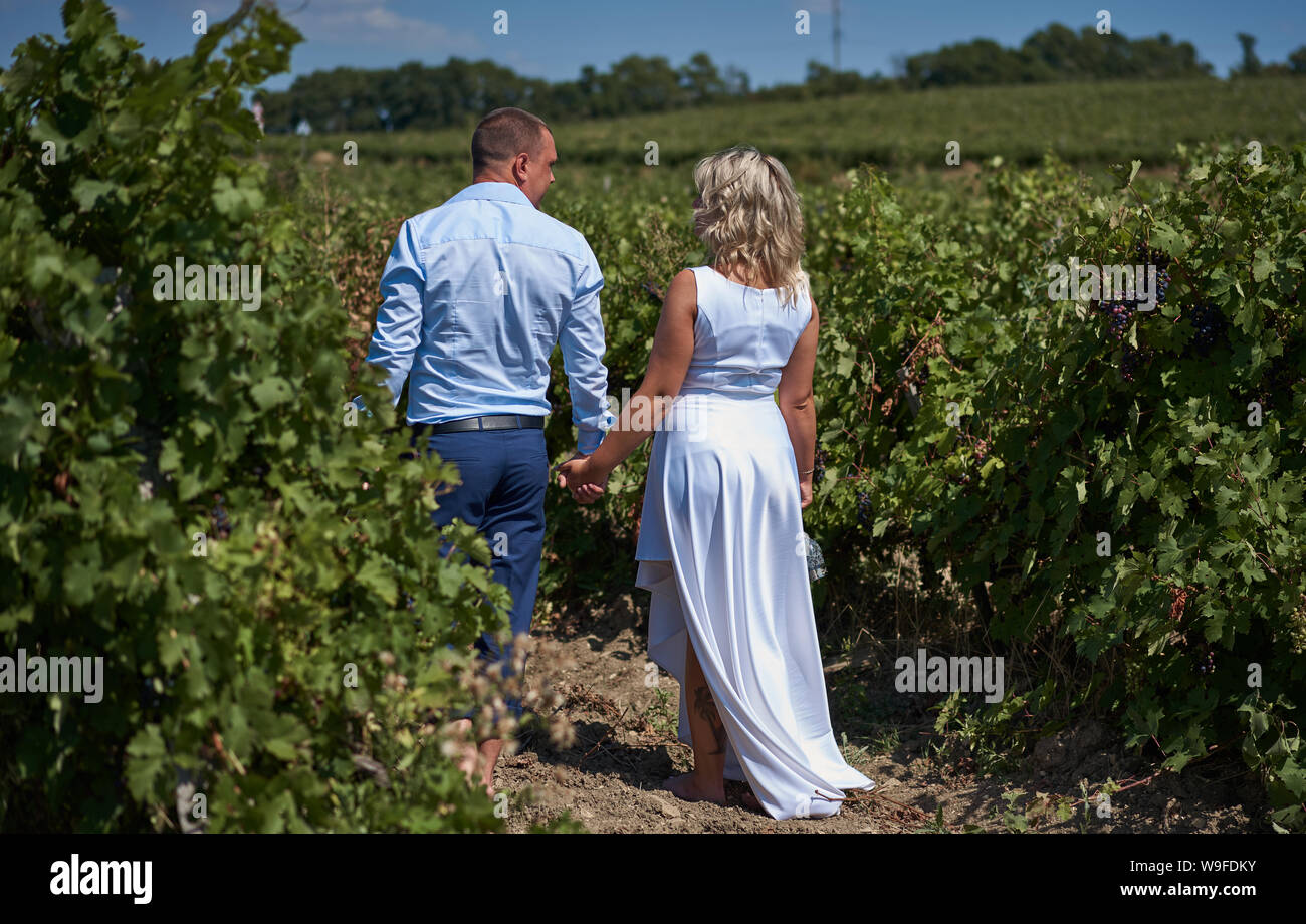 couple in love among the vineyards Stock Photo