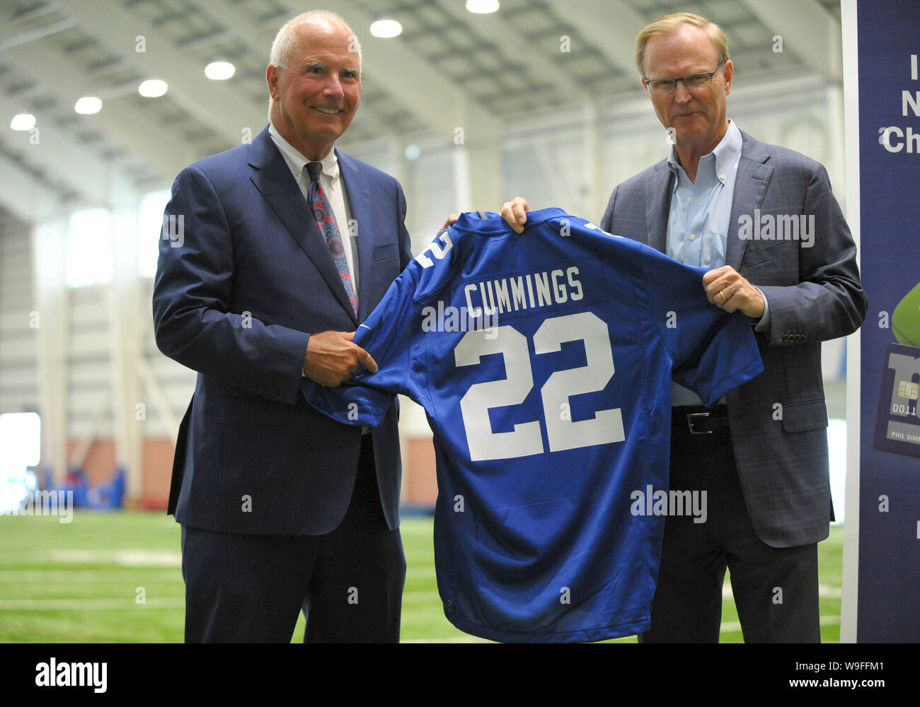 East Rutherford, New Jersey, USA. 13th Aug 2019. Investors Bank President KEVIN CUMMINGS and Team President JOHN MARA show off the custom team uniform to the media at the Quest Diagnostic Training Center, East Rutherford, NJ. (Credit Image: © Bennett CohenZUMA Wire) Credit: ZUMA Press, Inc./Alamy Live News Stock Photo