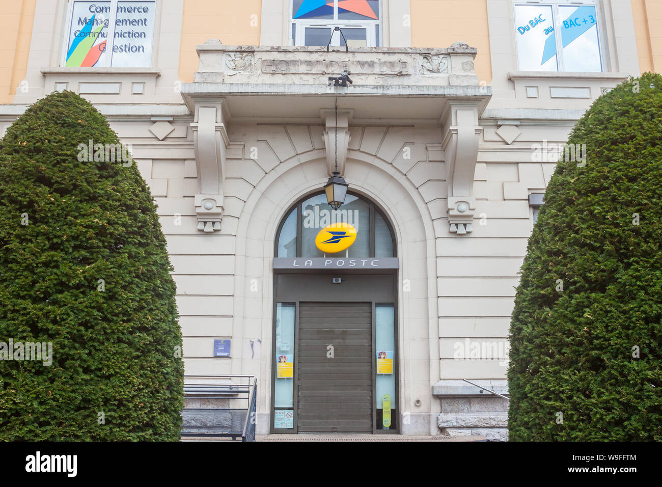 VILLEURBANNE, FRANCE - JULY 15, 2019: Logo of La Poste on their local post office for Villeurbanne. Groupe La Poste is the public postal service of Fr Stock Photo