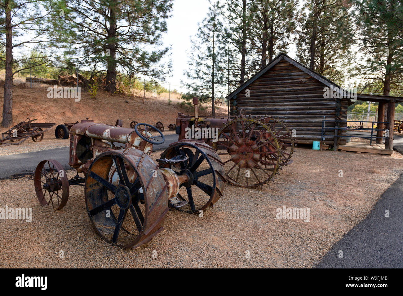 Historical farm equipment at Larsen apple ranch in Applehill, California along highway 50 in the sierra foothills. Stock Photo