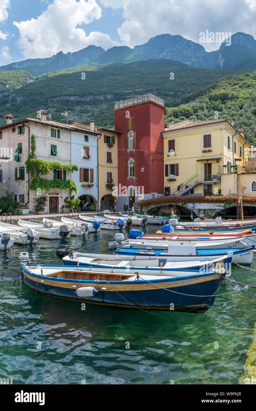 Cassone, Italy - 31 July, 2019 : This is fishing boats in Cassone harbour on Lake Garda in Italy Stock Photo
