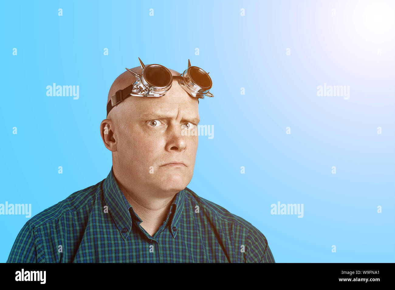 Man in glasses blue shirt hi-res stock photography and images - Alamy