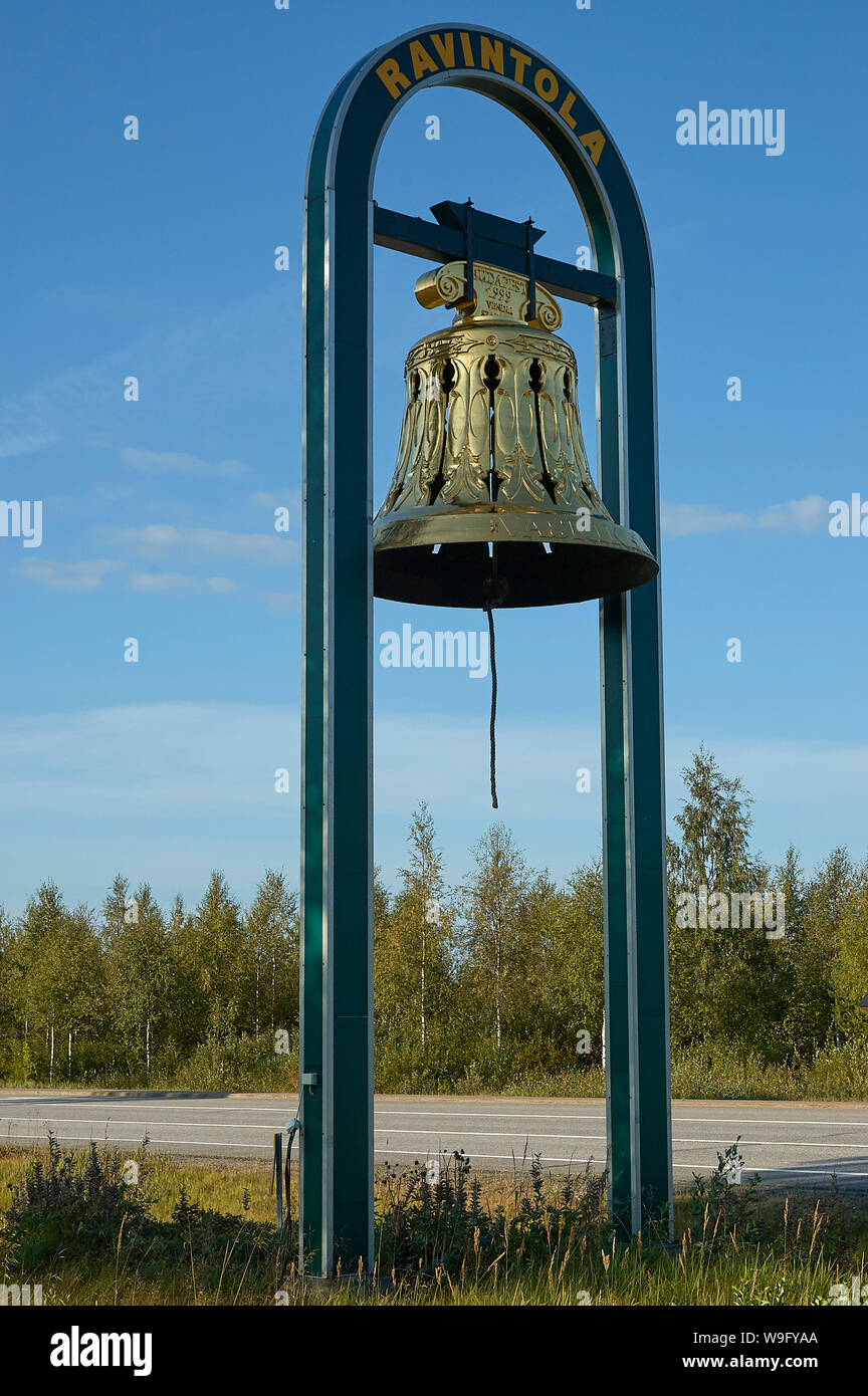 A beautiful old brass bell, displayed at a finnish fuel station Stock Photo