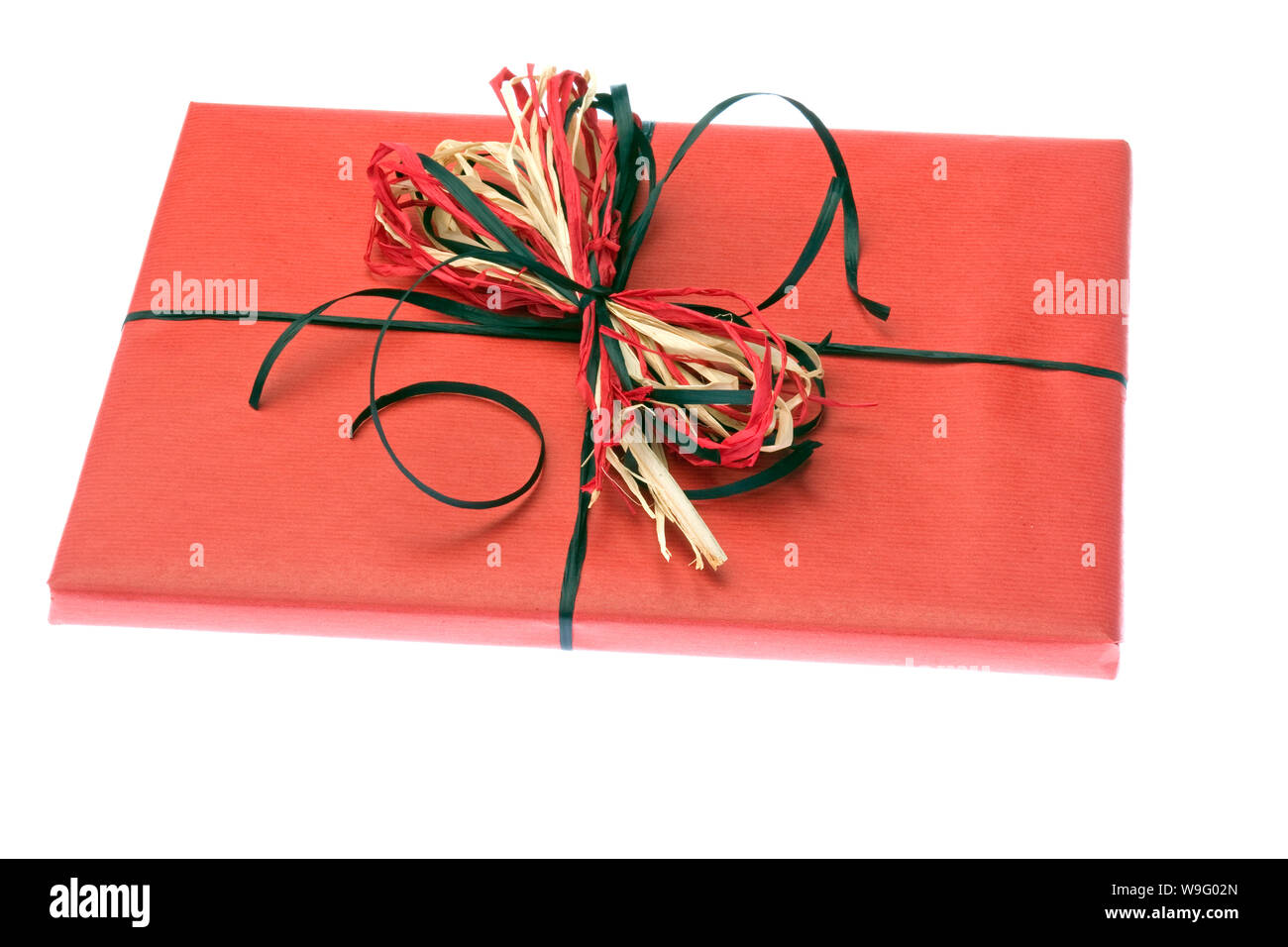 Brown Gift Tag With Red Raffia Ribbon Stock Photo - Download Image