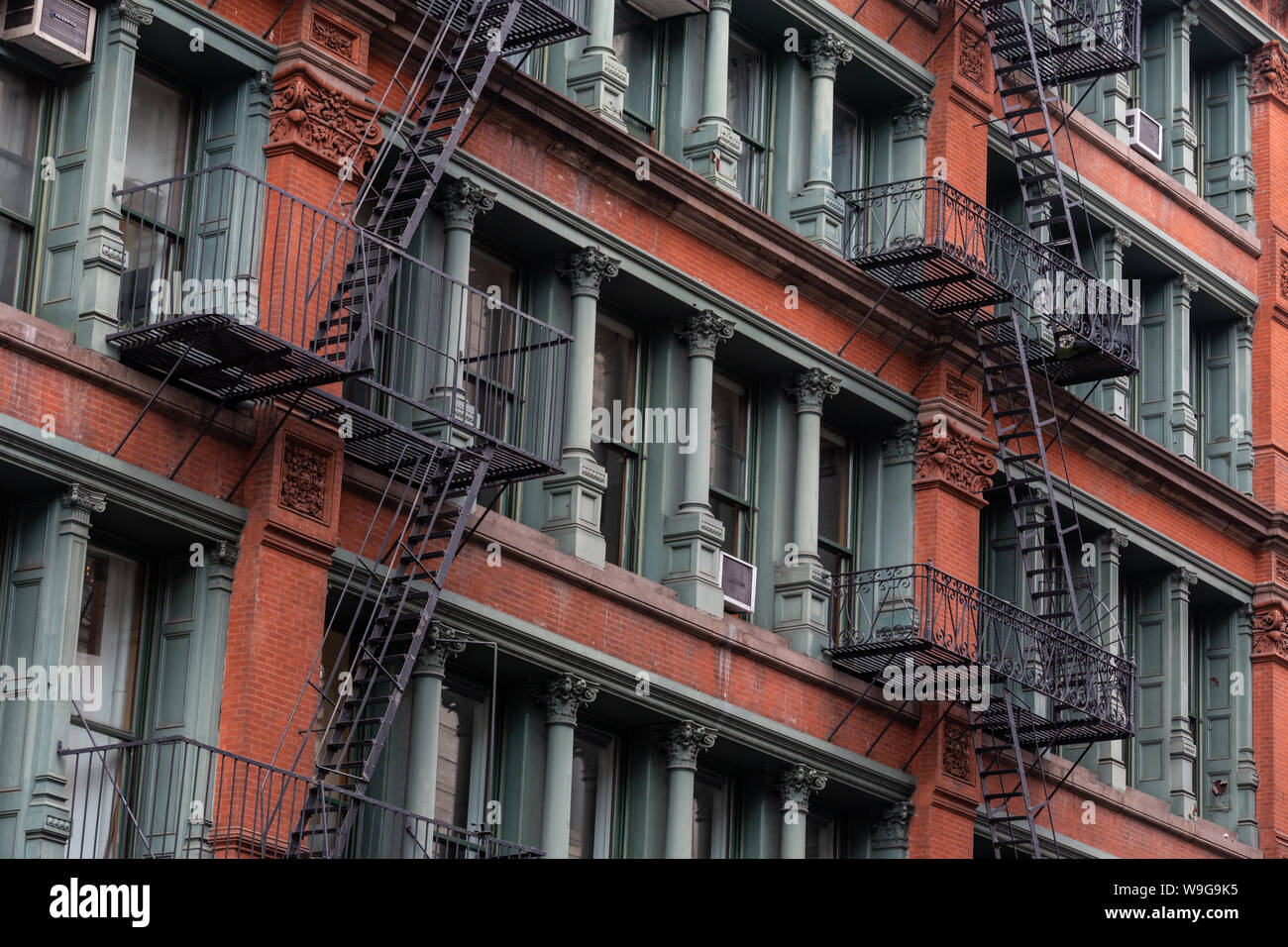 A fire escape of an apartment building in New York city Stock Photo