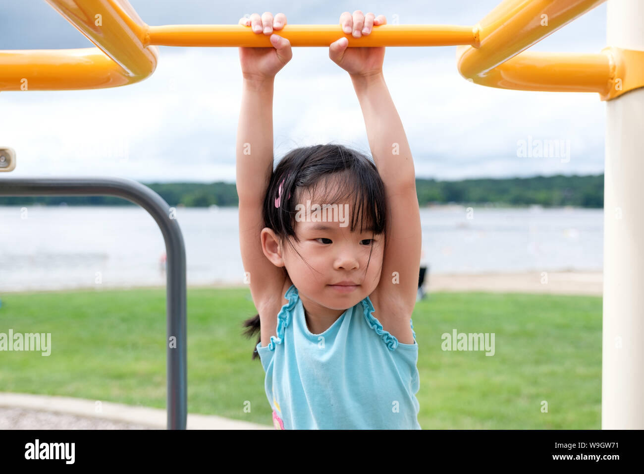 Active little toddler girl on the playground Stock Photo Alamy