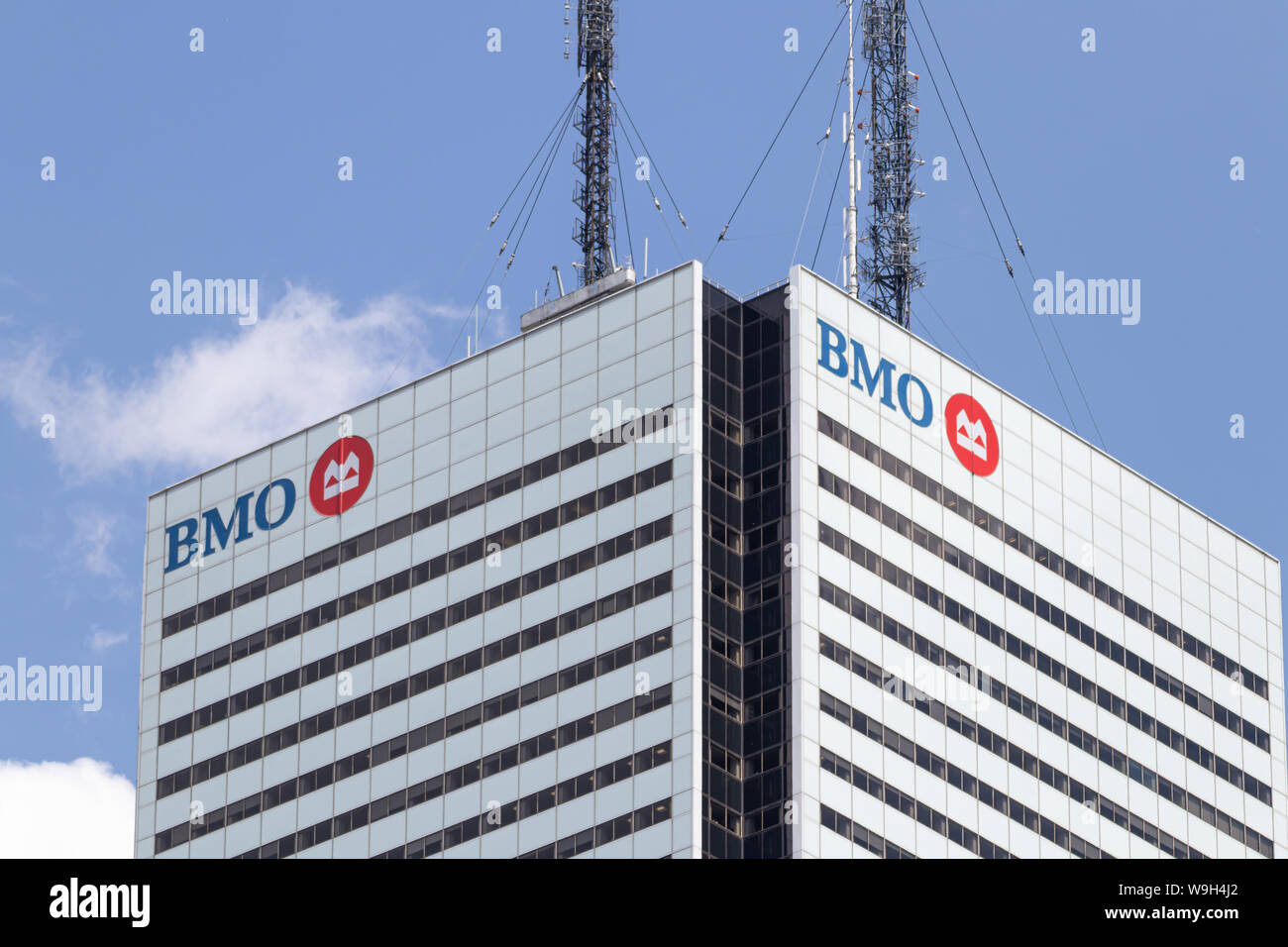 Top of First Canadian Place skyscraper in downtown Toronto with BMO (Bank of Montreal) logo seen on each side. Stock Photo