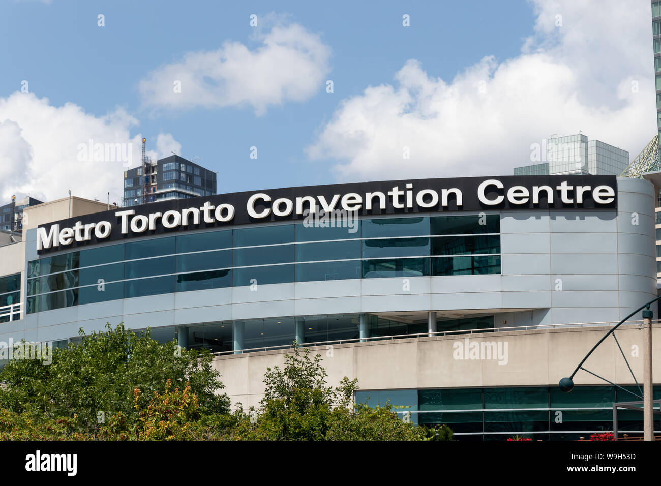 Front of Metro Toronto Convention Centre on partly cloudy, sunny day in downtown Toronto. Stock Photo