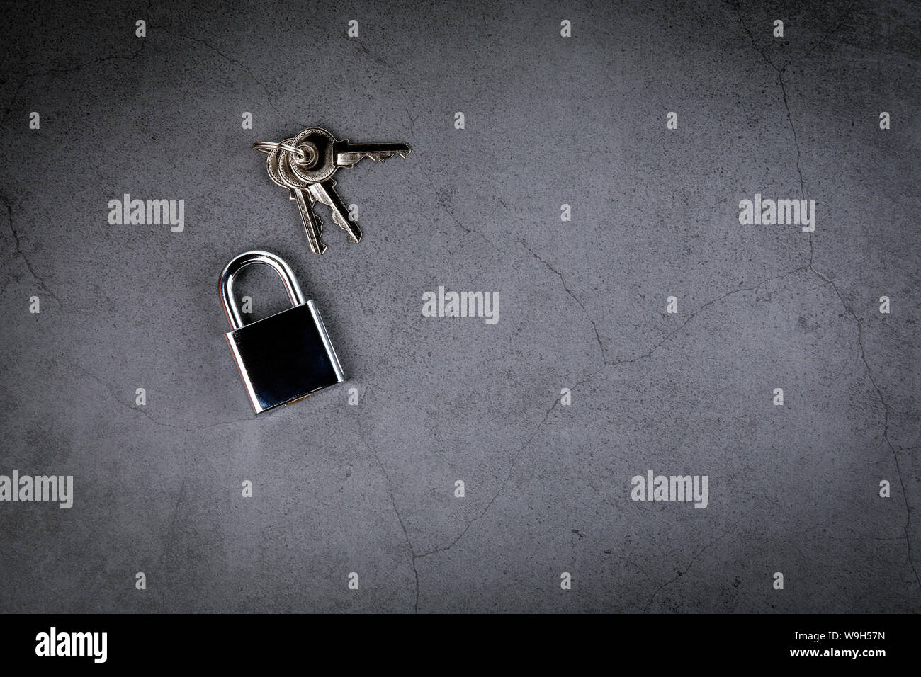 Padlock on gray concrete background. Privacy and Internet security concept Stock Photo