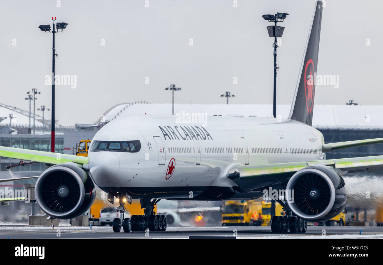 Air Canada Boeing 777 seen at the de-icing pad at Toronto Pearson Intl. Airport. Stock Photo
