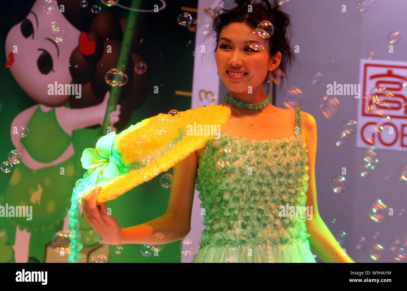 A model displays a dress which is made of condoms during a fashion show at  the 4th China Reproductive Health/Family Planning New Technologies and Prod  Stock Photo - Alamy