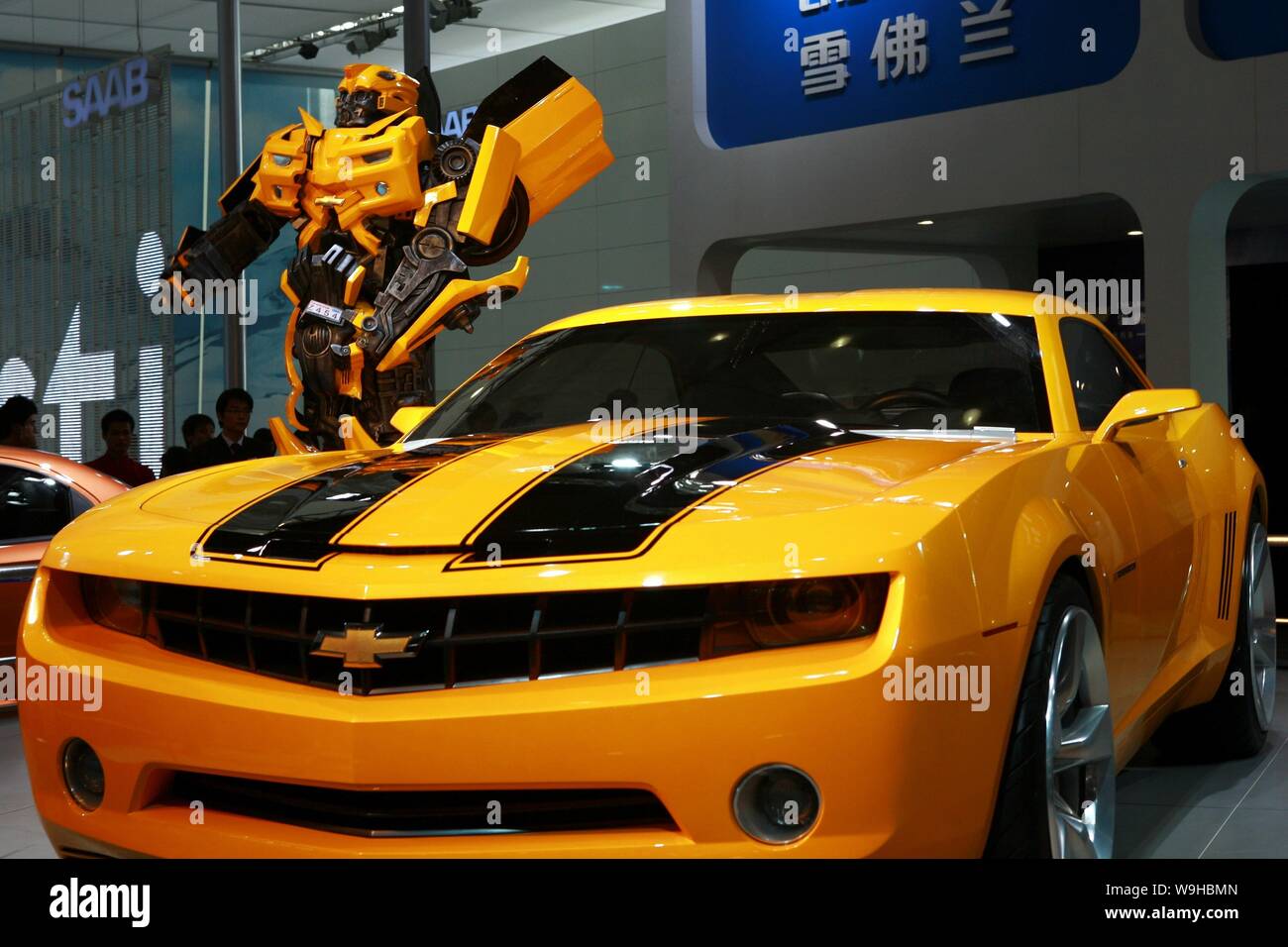 View of a model of Transformer Bumblebee and a Chevrolet Camaro car on  display during Auto Guangzhou 2007 in Guangzhou, November 20, 2007. Auto  Guan Stock Photo - Alamy