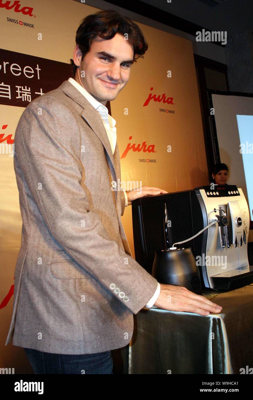 Roger Federer of Switzerland poses during a promotional event for Jura, a  Swiss brand of coffee machine, in Shanghai, November 8, 2007 Stock Photo -  Alamy