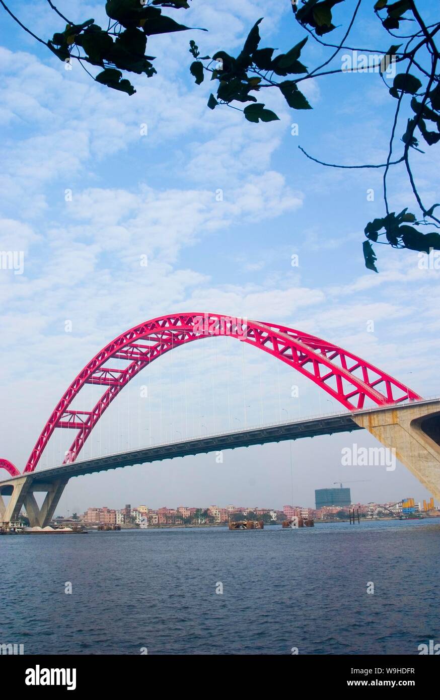 View of Xin Guang Bridge which is a 3 span continuous arch bridge with the longest centre span in the world and sightseeing elevators  installed at bo Stock Photo