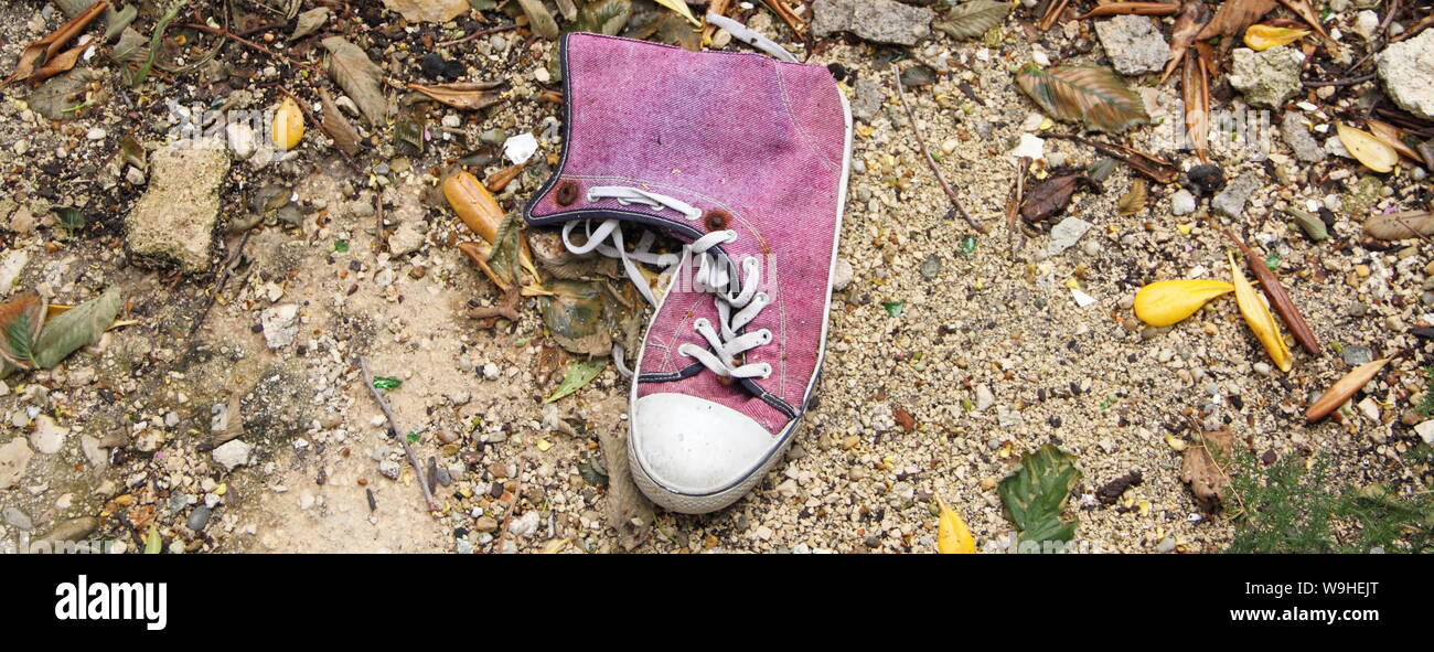 an old lost pink shoe Stock Photo - Alamy