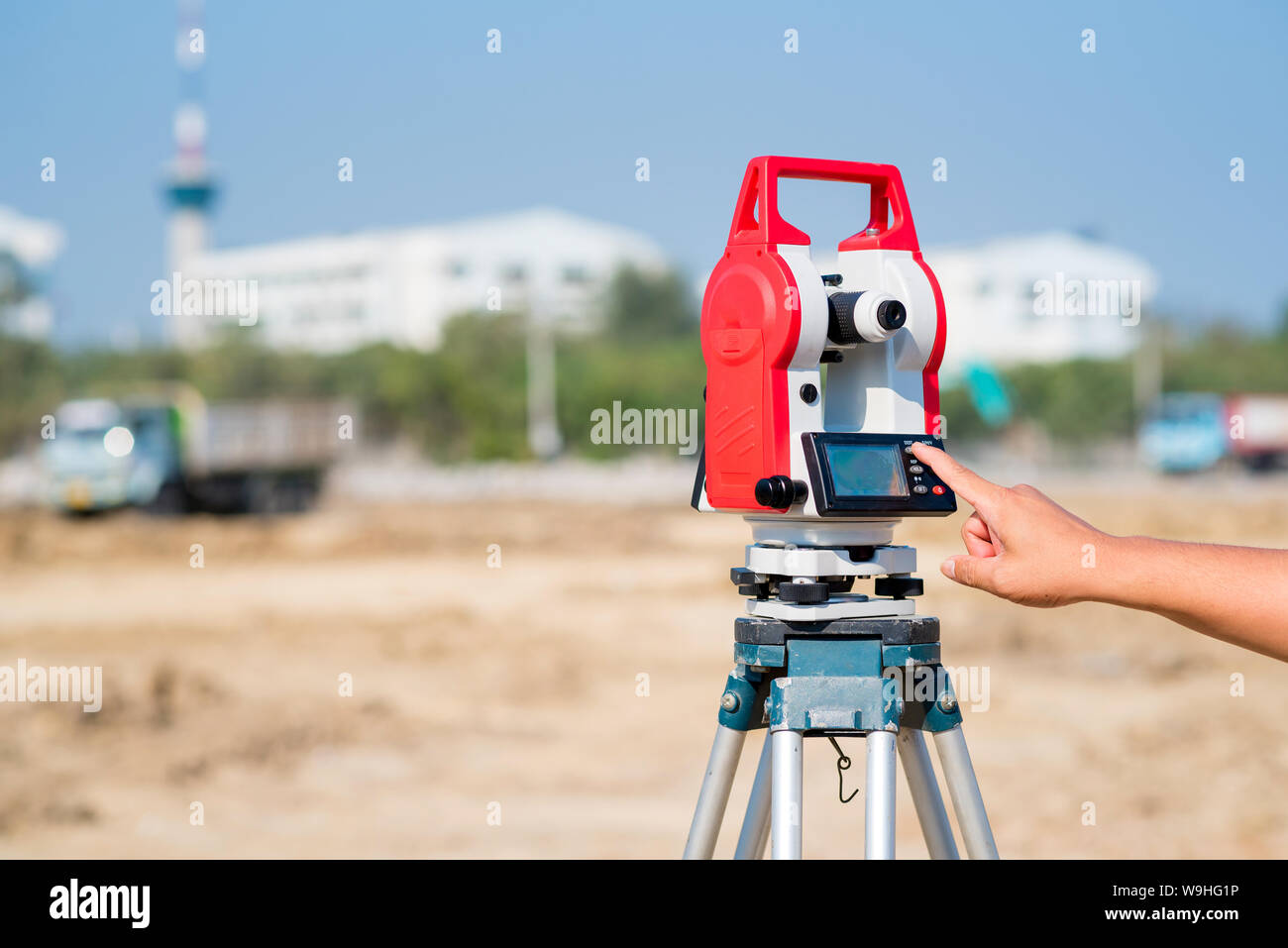 Civil engineer use surveyor equipment theodolite checking construction site for new Infrastructure project. photo concept for engineering work. Stock Photo