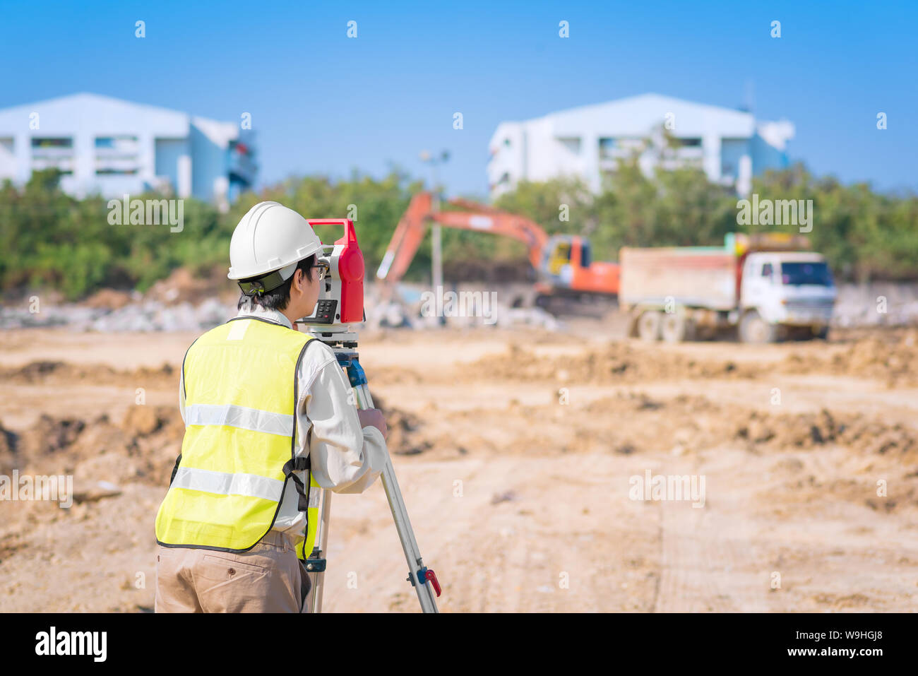 Asian construction engineer checking construction site for new Infrastructure project. Stock Photo