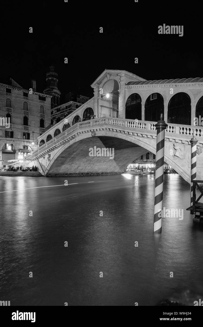 the Ponte di Rialto or Rialto Bridge at night, Venice Stock Photo